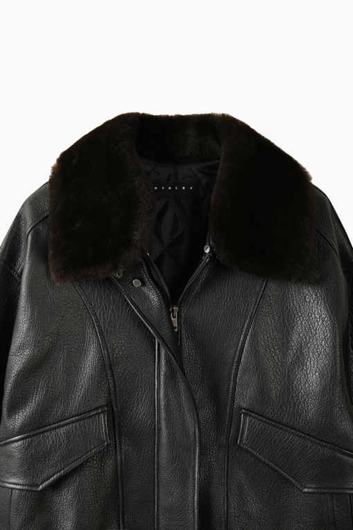 https://img.benettonmall.com/PARTS/KS/26F/SALE36661BK_MB_D2.jpg?cb=1793028892