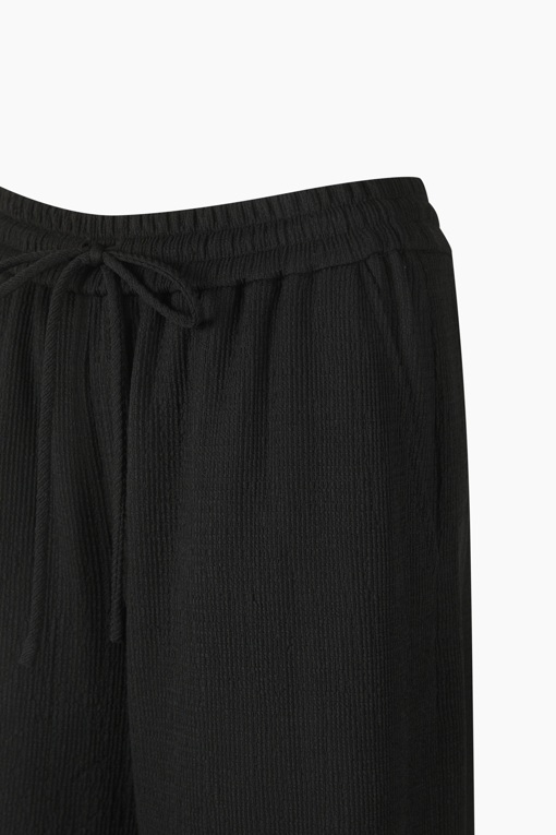 https://img.benettonmall.com/PARTS/KS/26S/SAPT42631BK_MB_D13.jpg?cb=1782918151